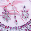 Women American Diamond-Studded Necklace & Earrings Set With Mangtika.