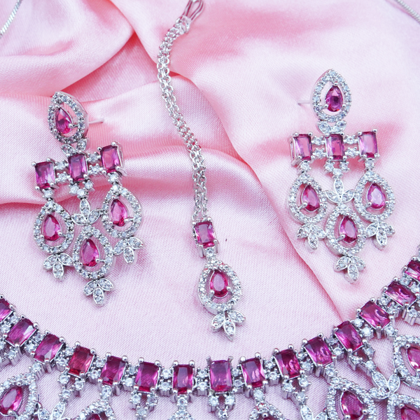Women American Diamond-Studded Necklace & Earrings Set With Mangtika.