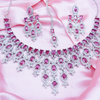 Women American Diamond-Studded Necklace & Earrings Set With Mangtika.