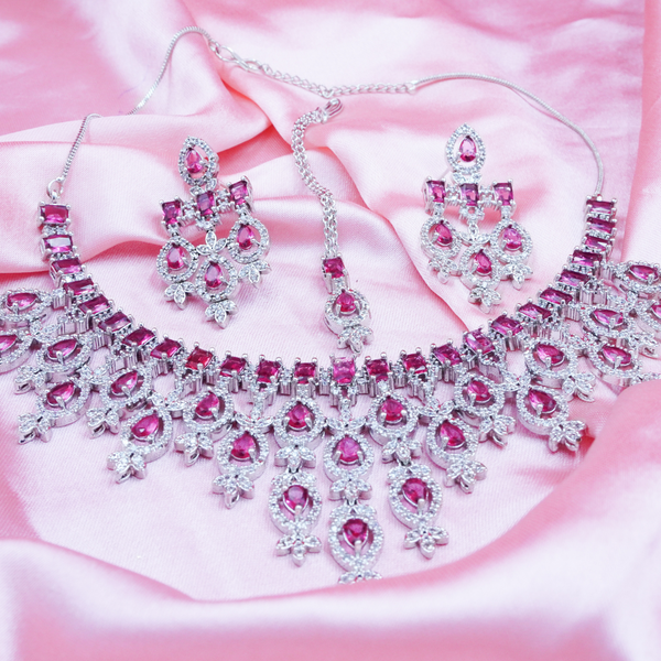 Women American Diamond-Studded Necklace & Earrings Set With Mangtika.