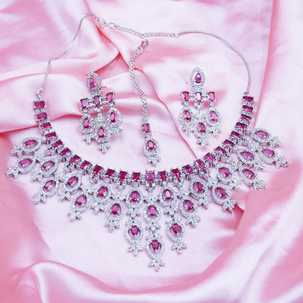 Women American Diamond-Studded Necklace & Earrings Set With Mangtika.