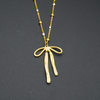 Gold Flowing Ribbon Bow Pendant For Women & Girls.