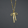 Gold Flowing Ribbon Bow Pendant For Women & Girls.